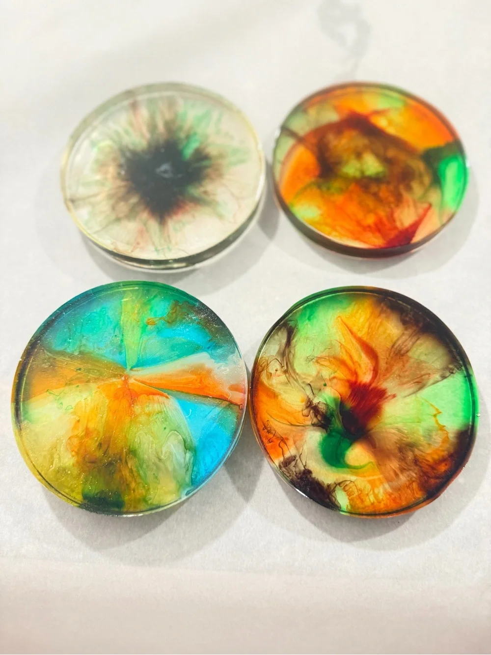 Handmade Resin Coaster with Swirl of Orange, Green and Red